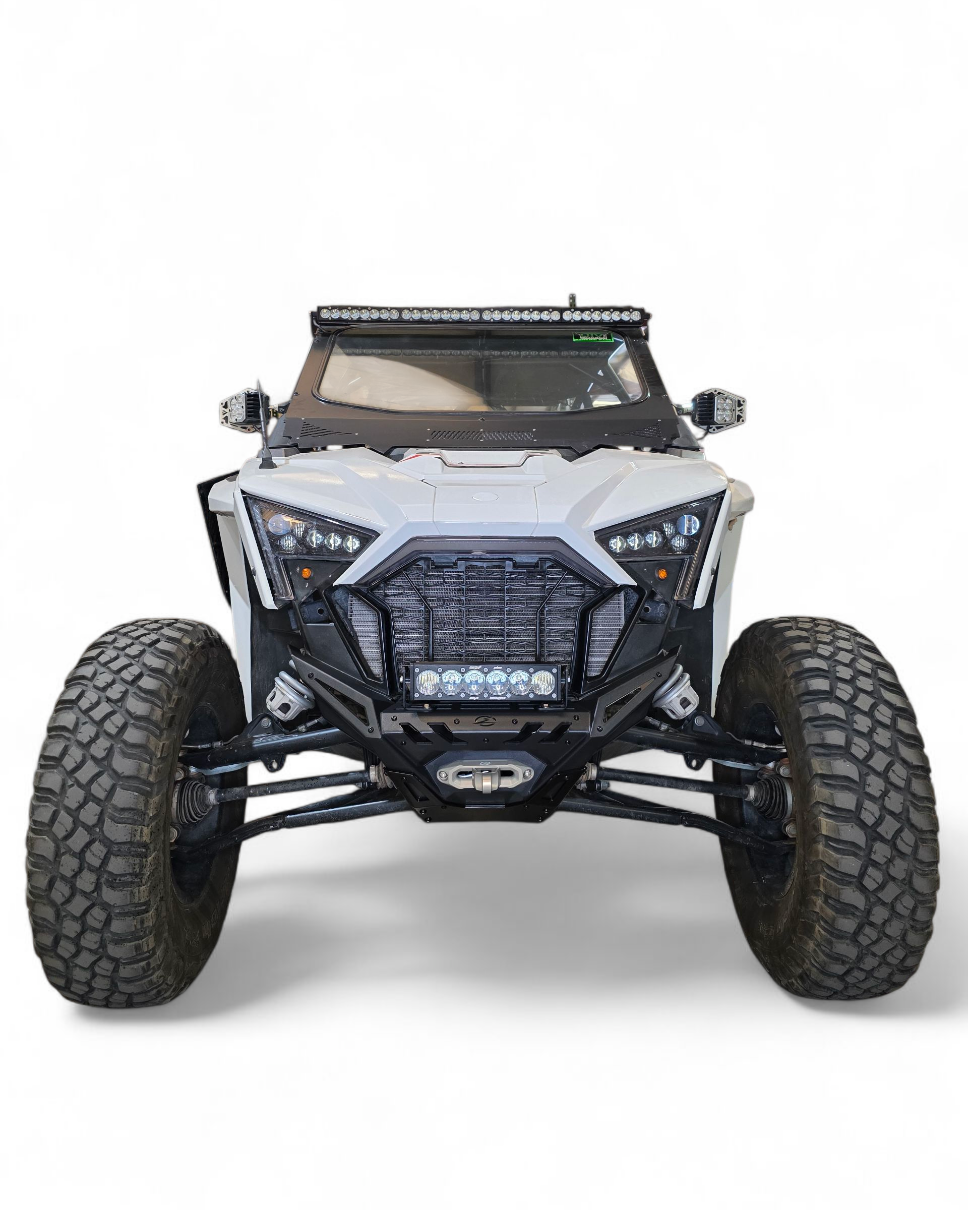Polaris RZR Pro XP front winch bumper showing satin black panels and contour-hugging fit