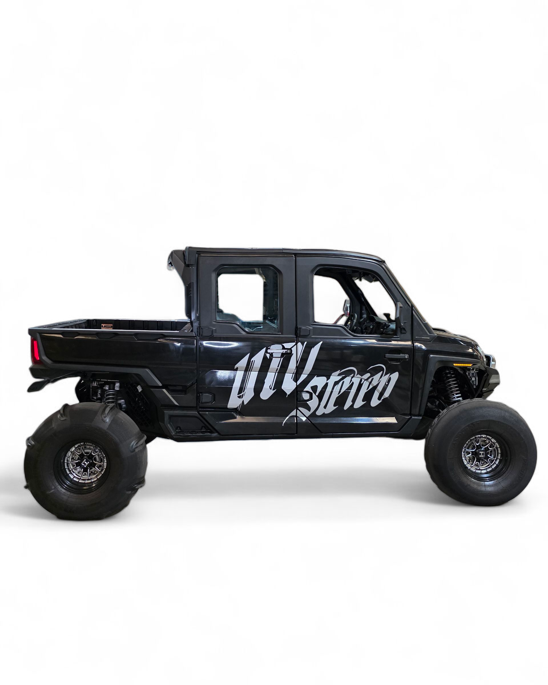 Black off-road vehicle with 'UTV Stereo' branding on a white background
