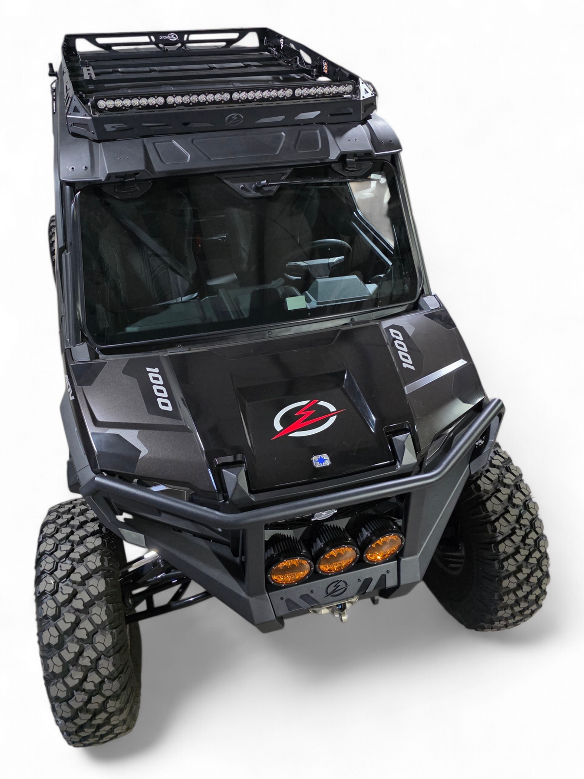 Front of a black Xpedition with the roof rack above the windshield, slightly angled
