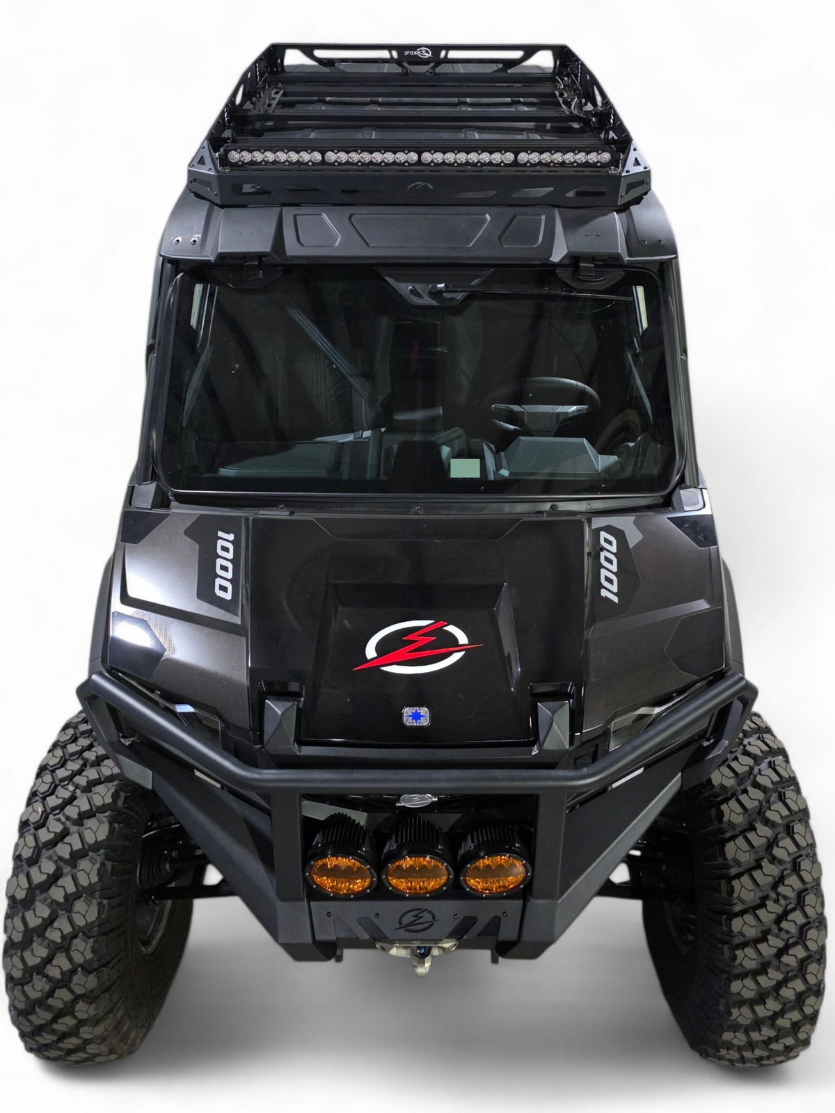 Close front view of the Xpedition hood and bumper with the roof rack edge above the windshield