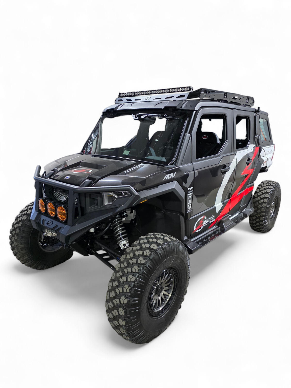 Front three-quarter view of a Polaris Xpedition with the EOD 4-Seat Roof Rack, front bumper, and amber lights