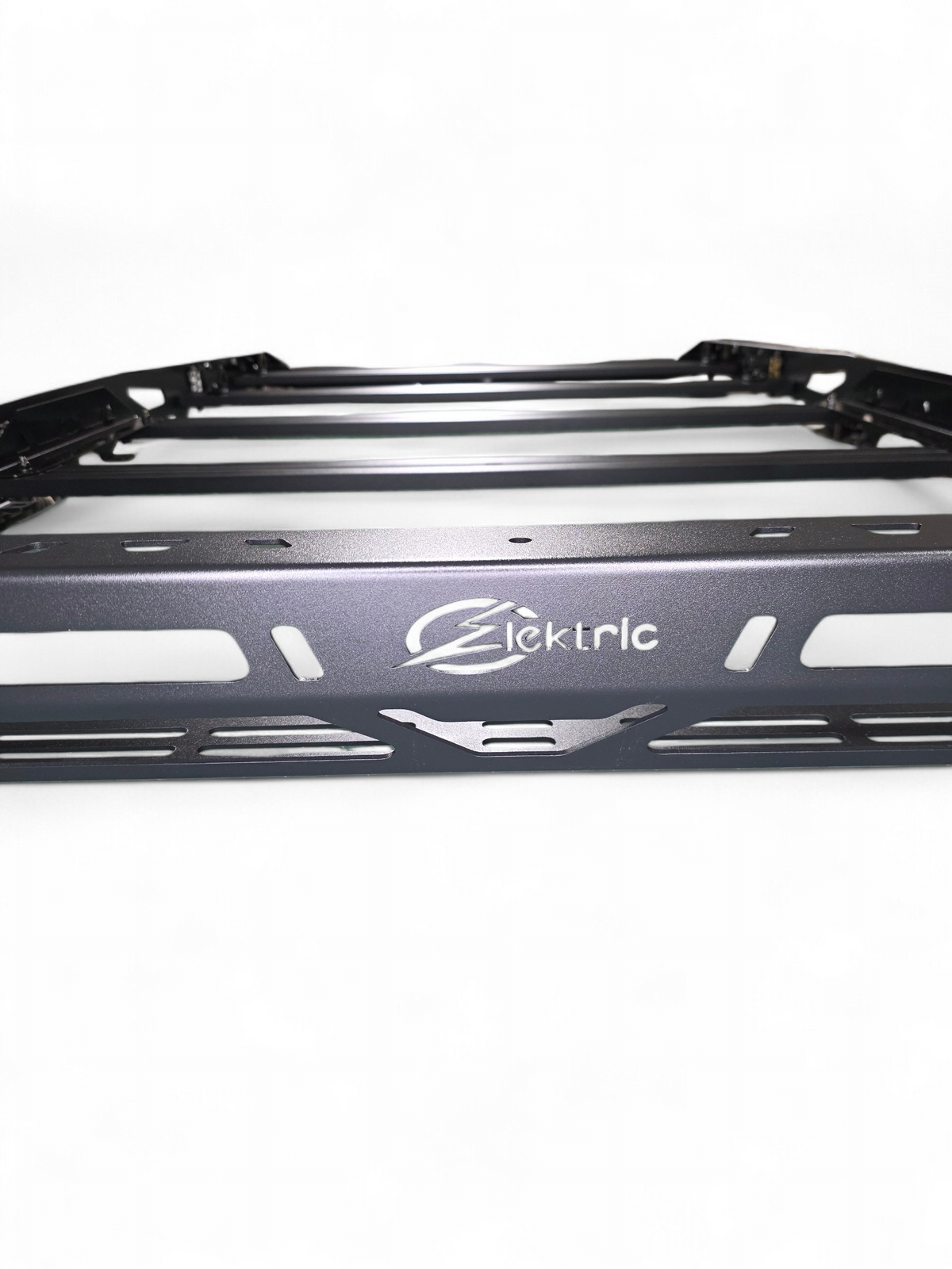 Close-up of the roof rack rail end with the Elektric Offroad Designs logo