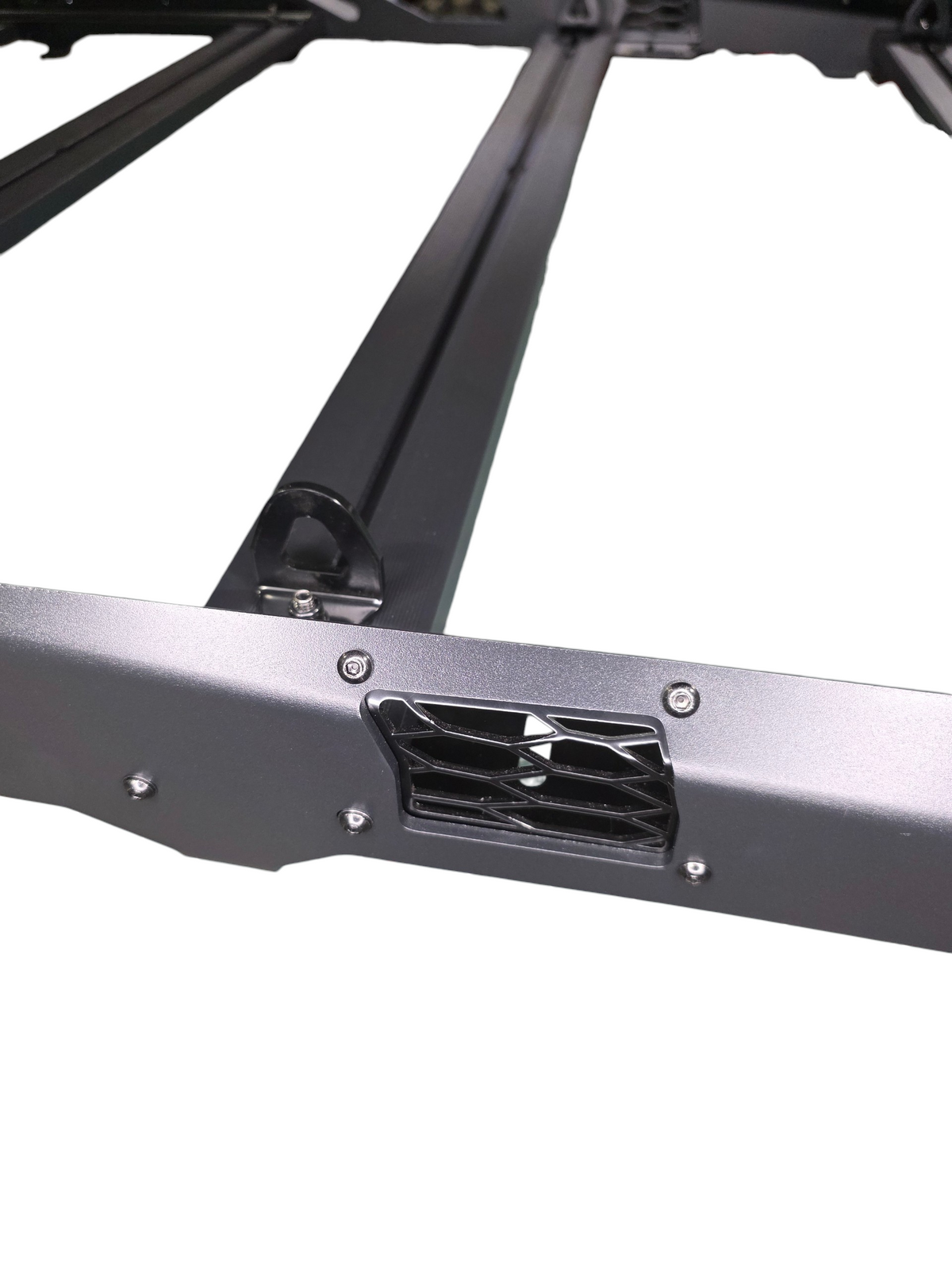 Side detail of the roof rack rail and a mounting bracket