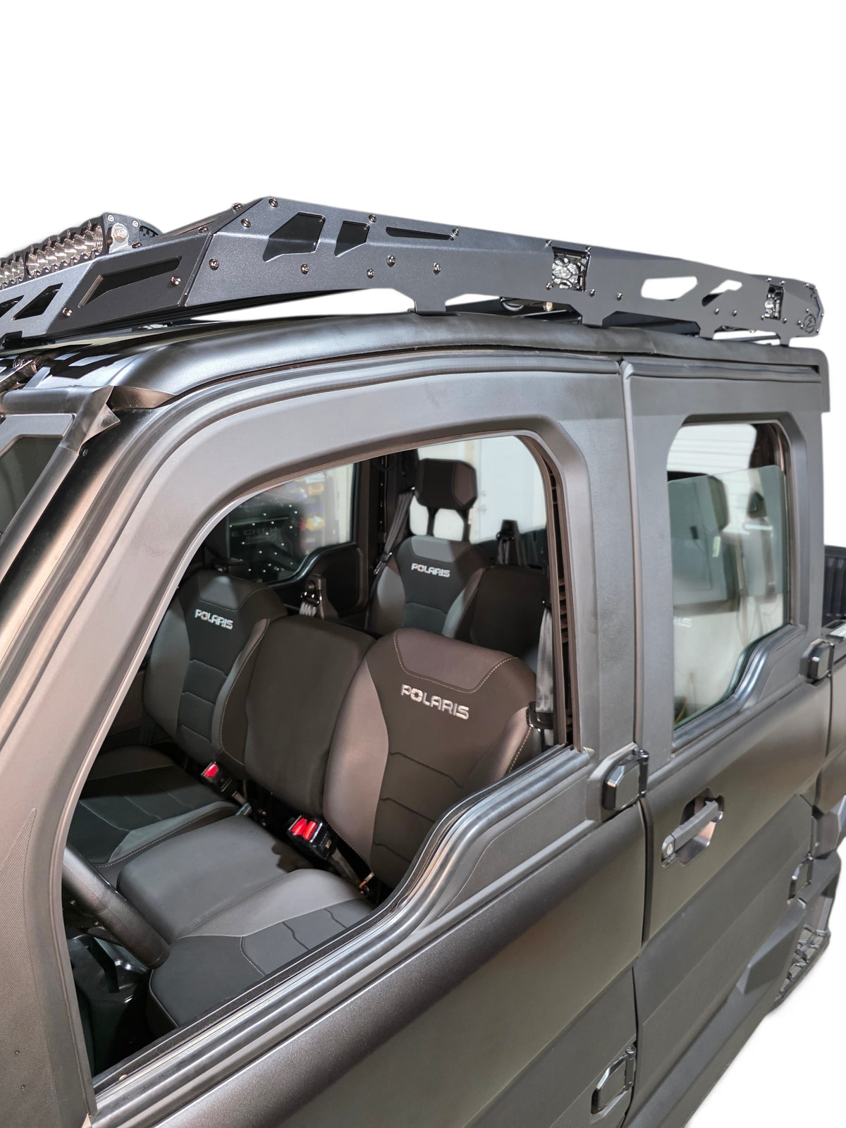 Front corner view of the roof rack installed above the Xpedition door and cab