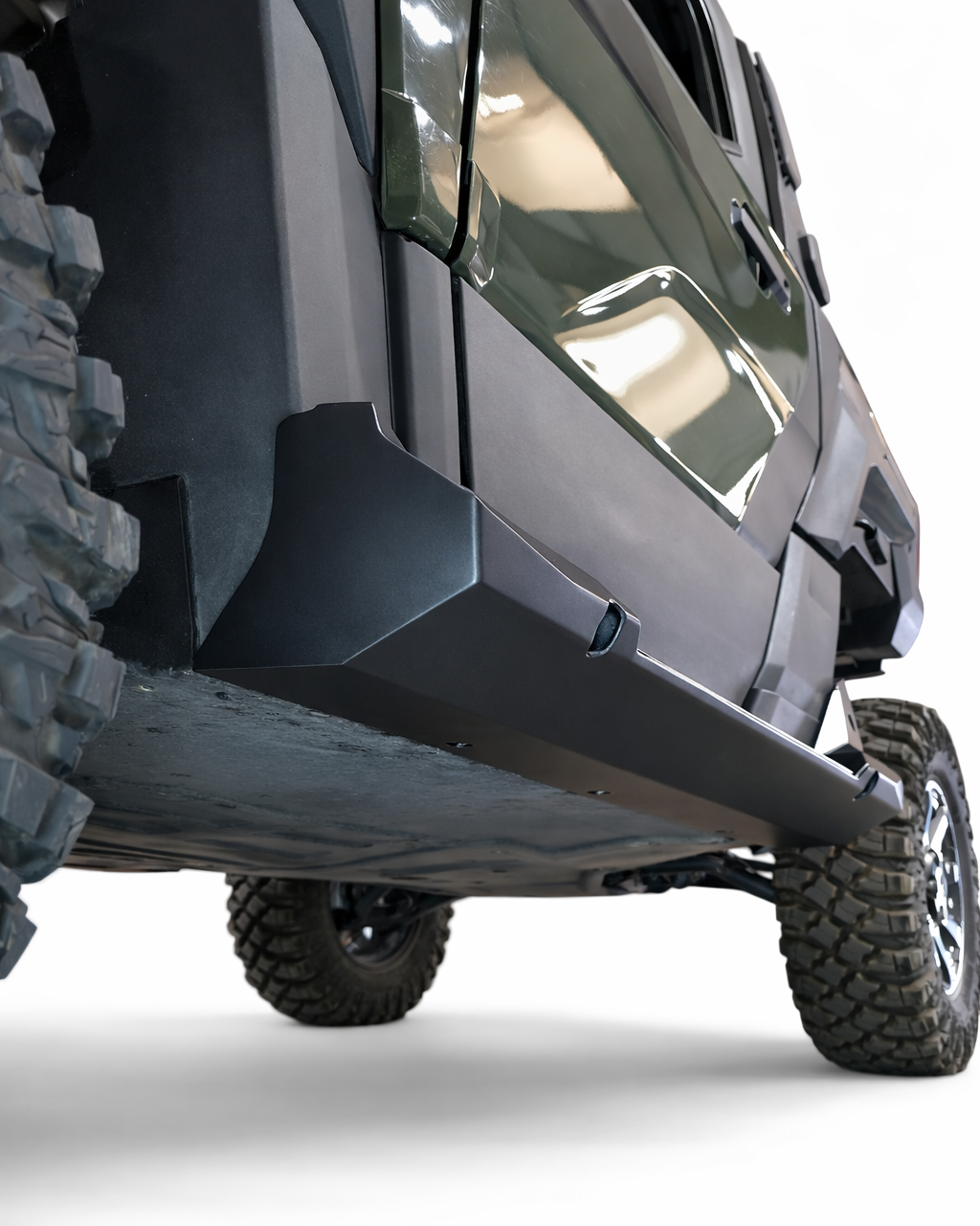 Polaris Xpedition 2-seat rock steps shown along the frame sides in hammer black with satin panels