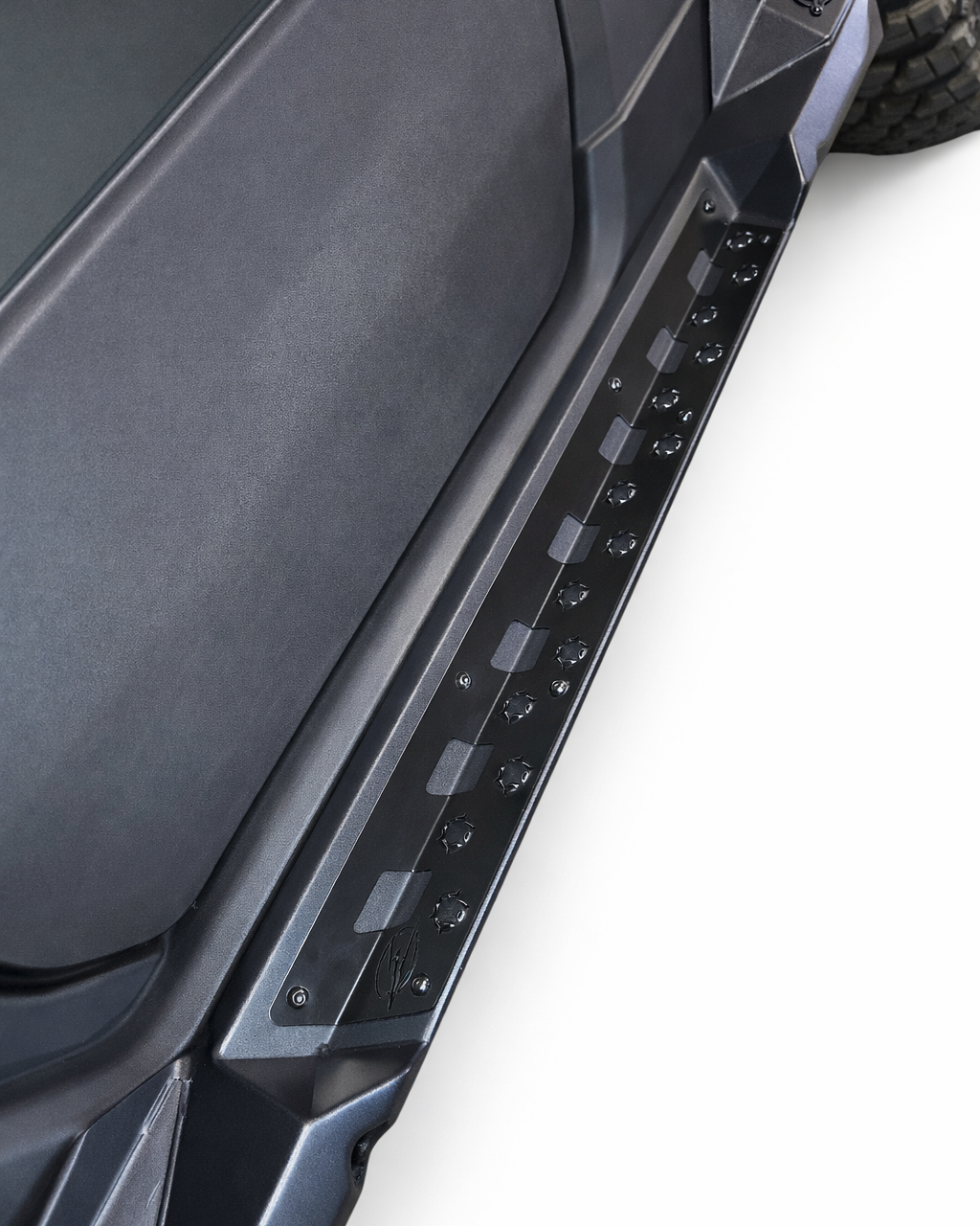 Satin black aluminum accent panel detail on Polaris Xpedition rock steps