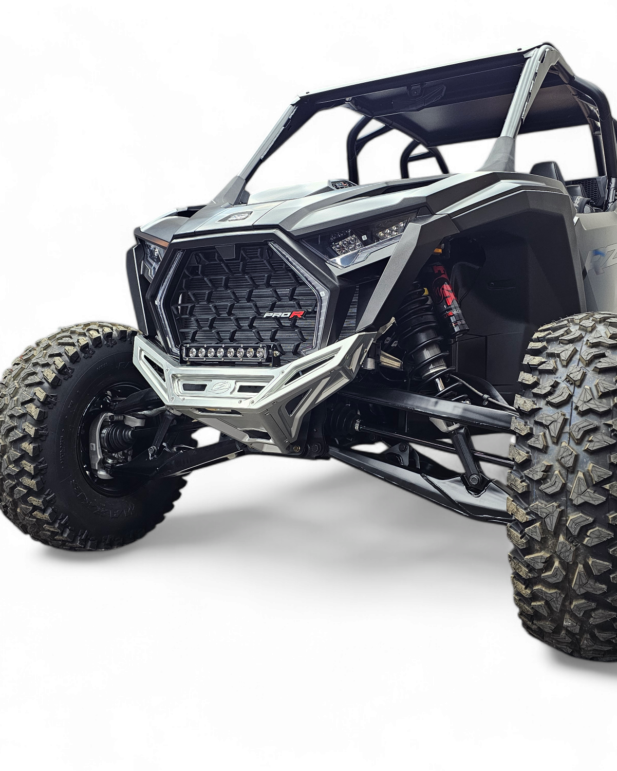 Machined billet aluminum front winch bumper installed on Polaris RZR Pro R in clear anodize