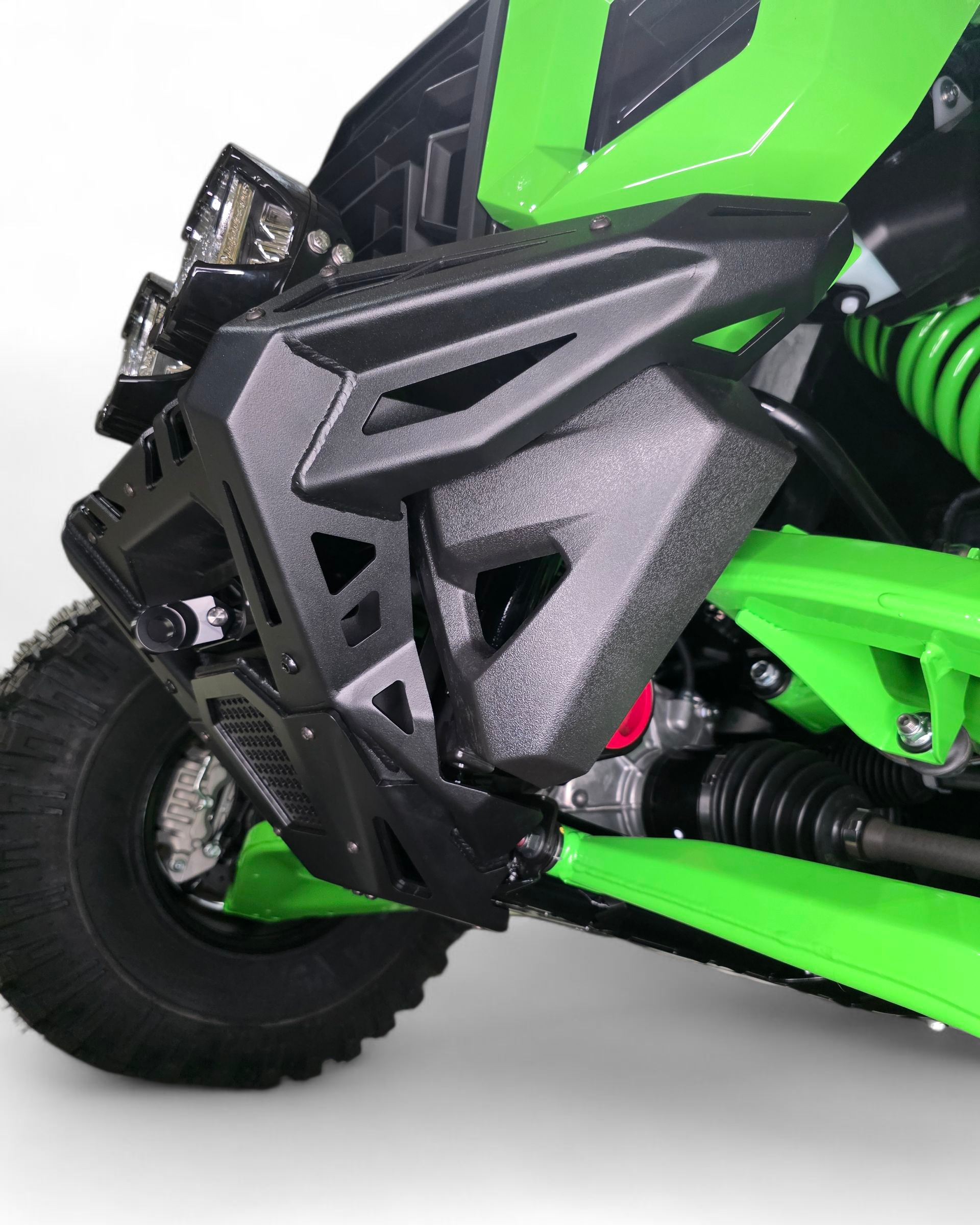 Driver side view of Volt Series front winch bumper installed on Kawasaki Teryx H2