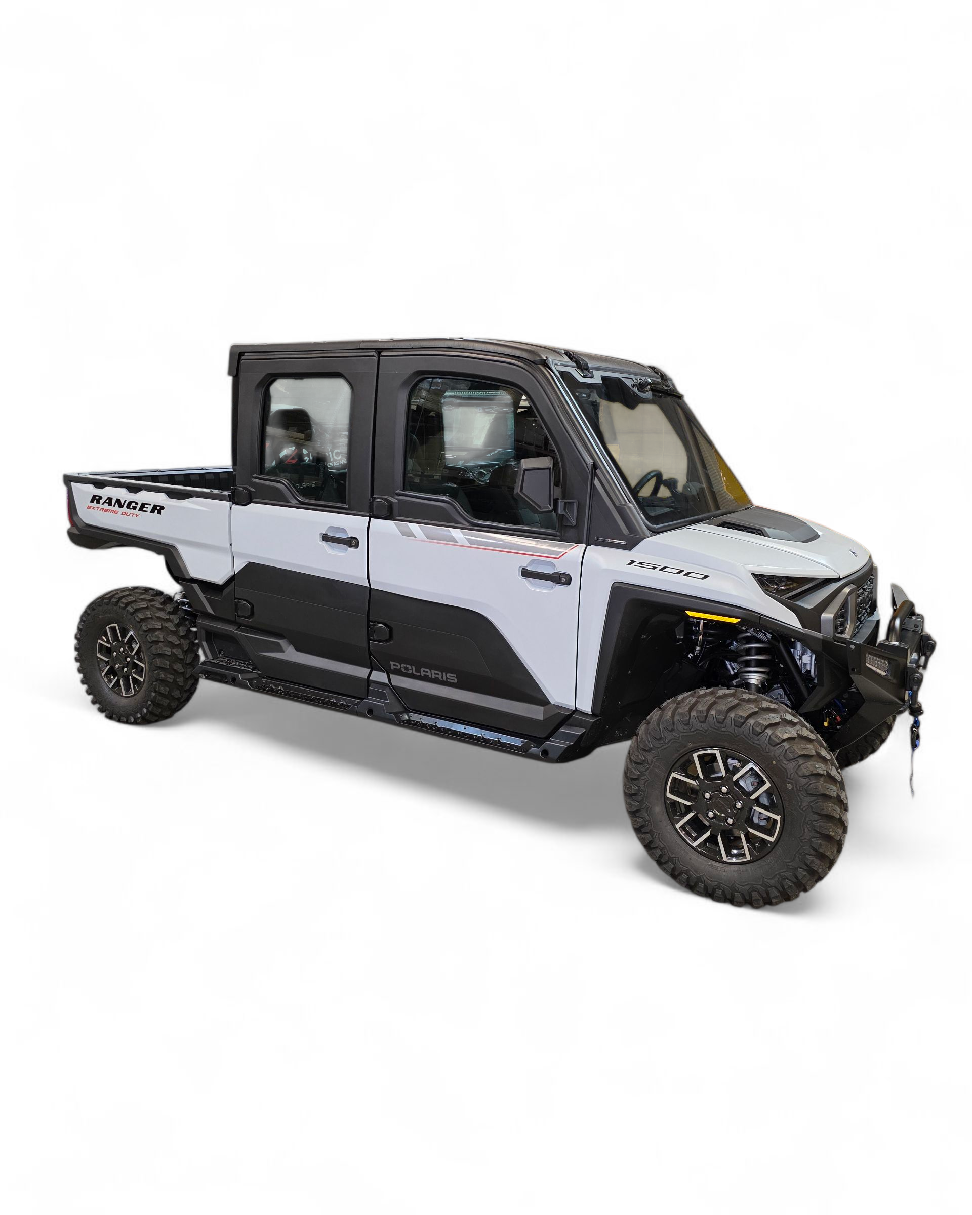 Passenger side rock slider on Polaris Ranger XD 1500 showing frame protection