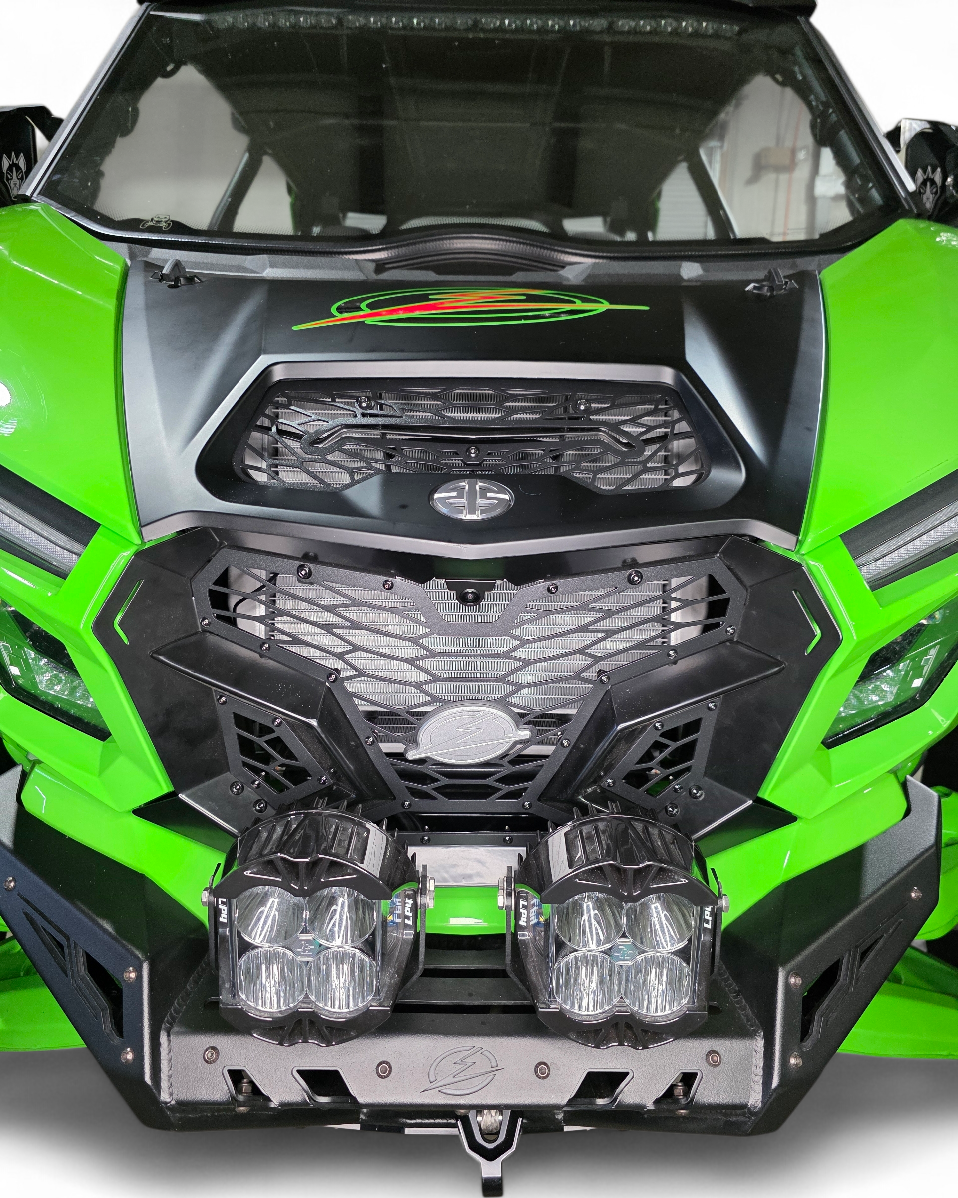 Angled view of Kawasaki Teryx H2 Volt grille showing satin black finish texture