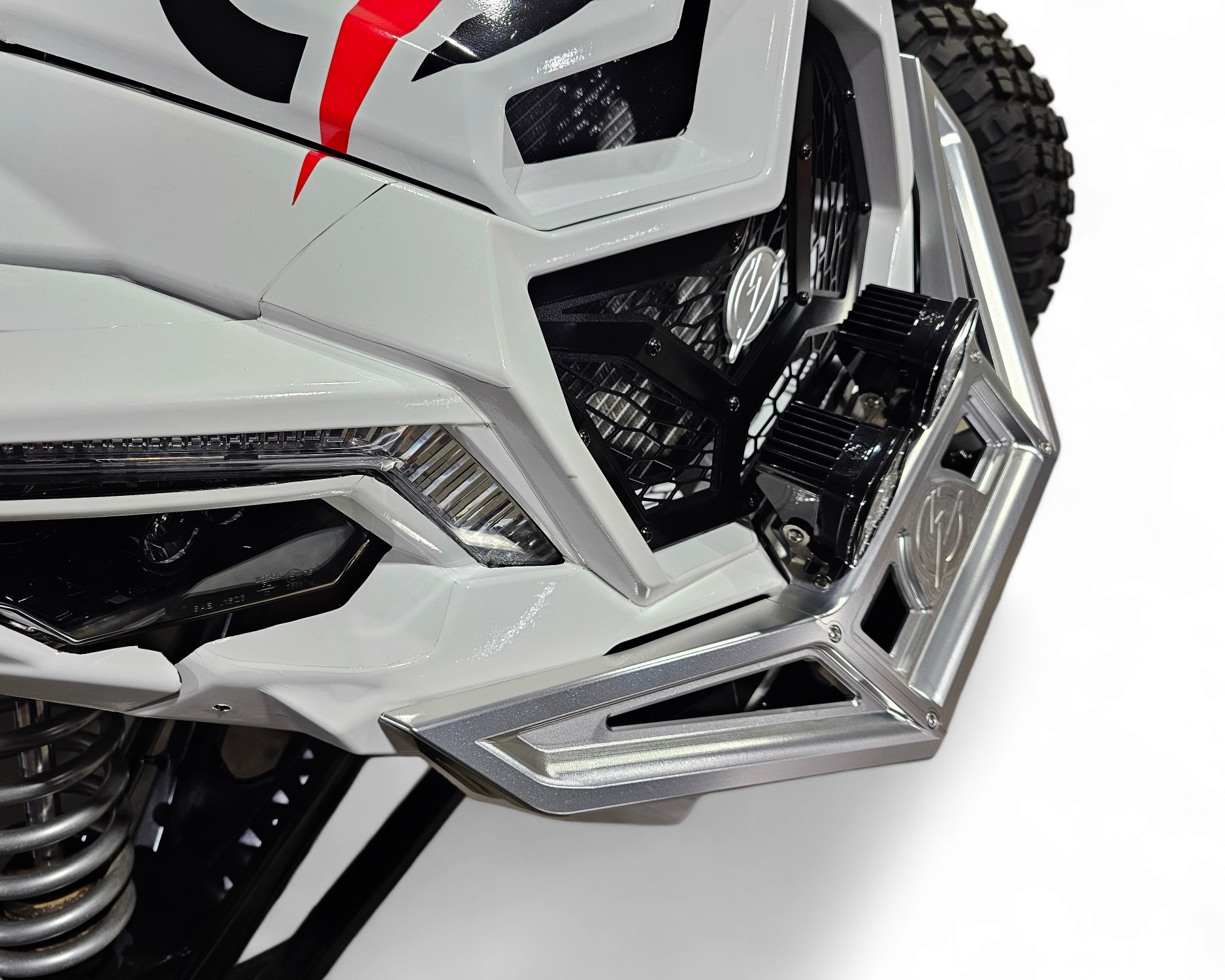 Corner machining detail of Can-Am Maverick X3 clear anodized billet front winch bumper showing CNC quality