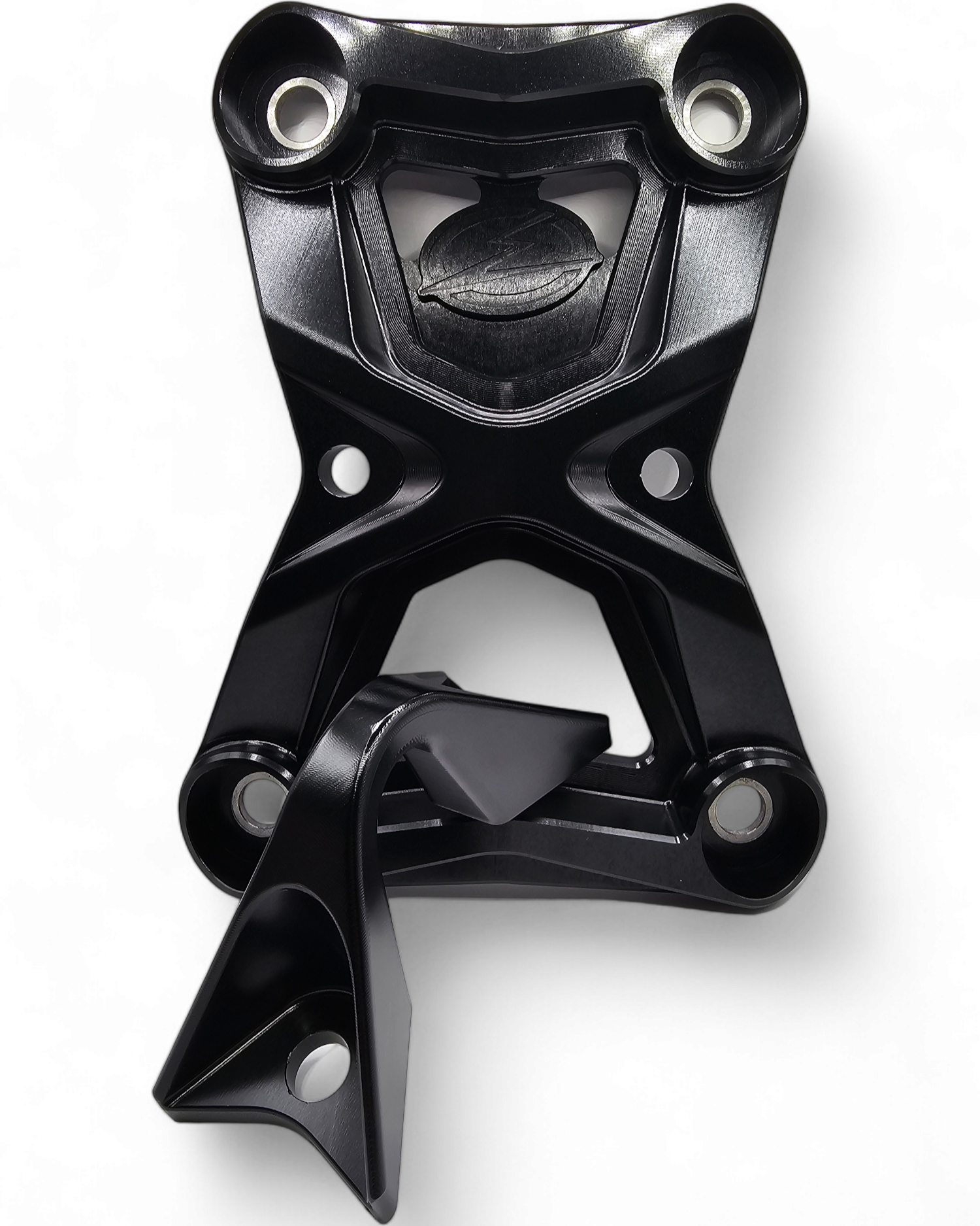 Integrated tow hook detail on Polaris RZR black radius rod plate