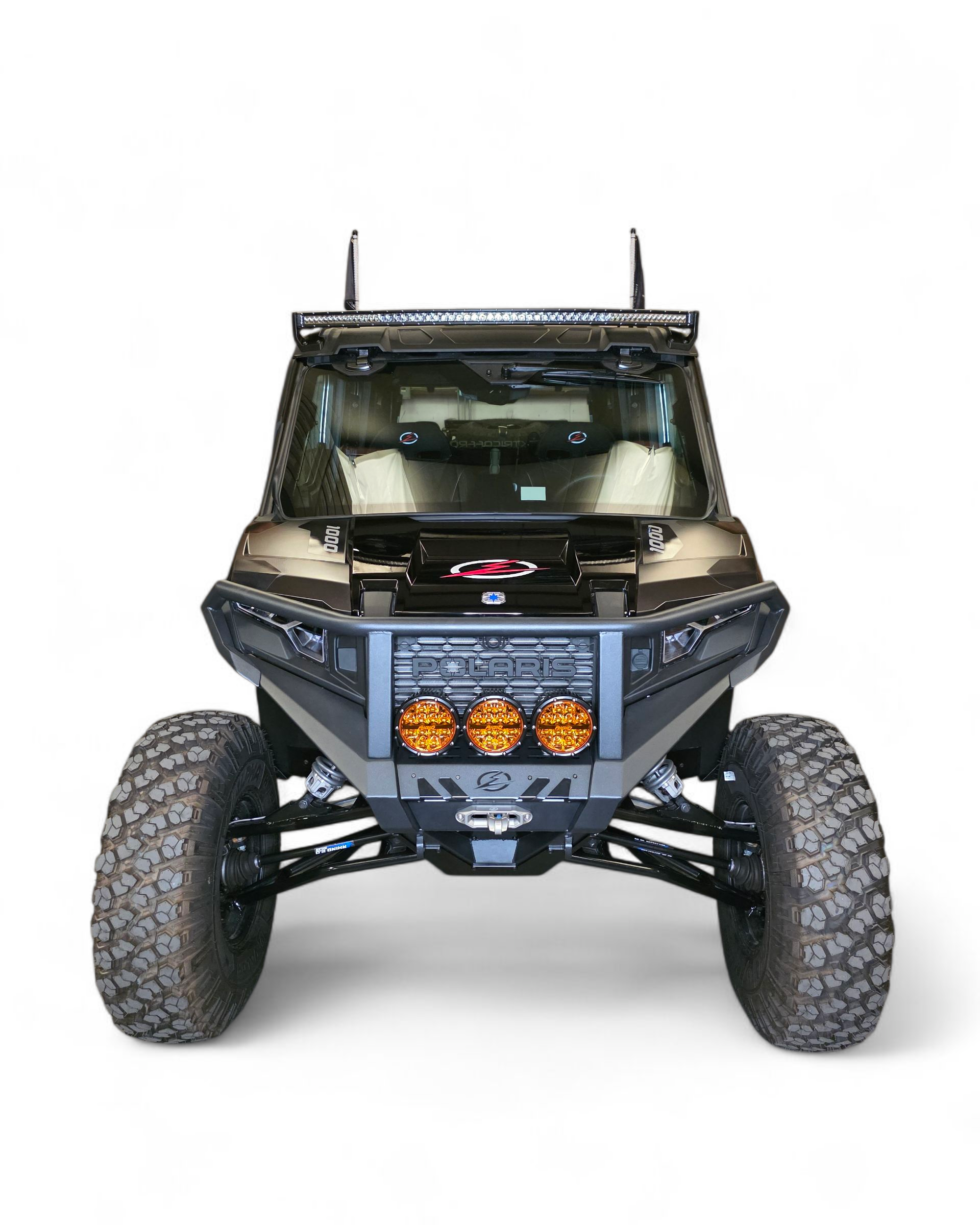 Front three-quarter view of Polaris Xpedition HDX Bumper with brush guard showing upper hood and grille protection
