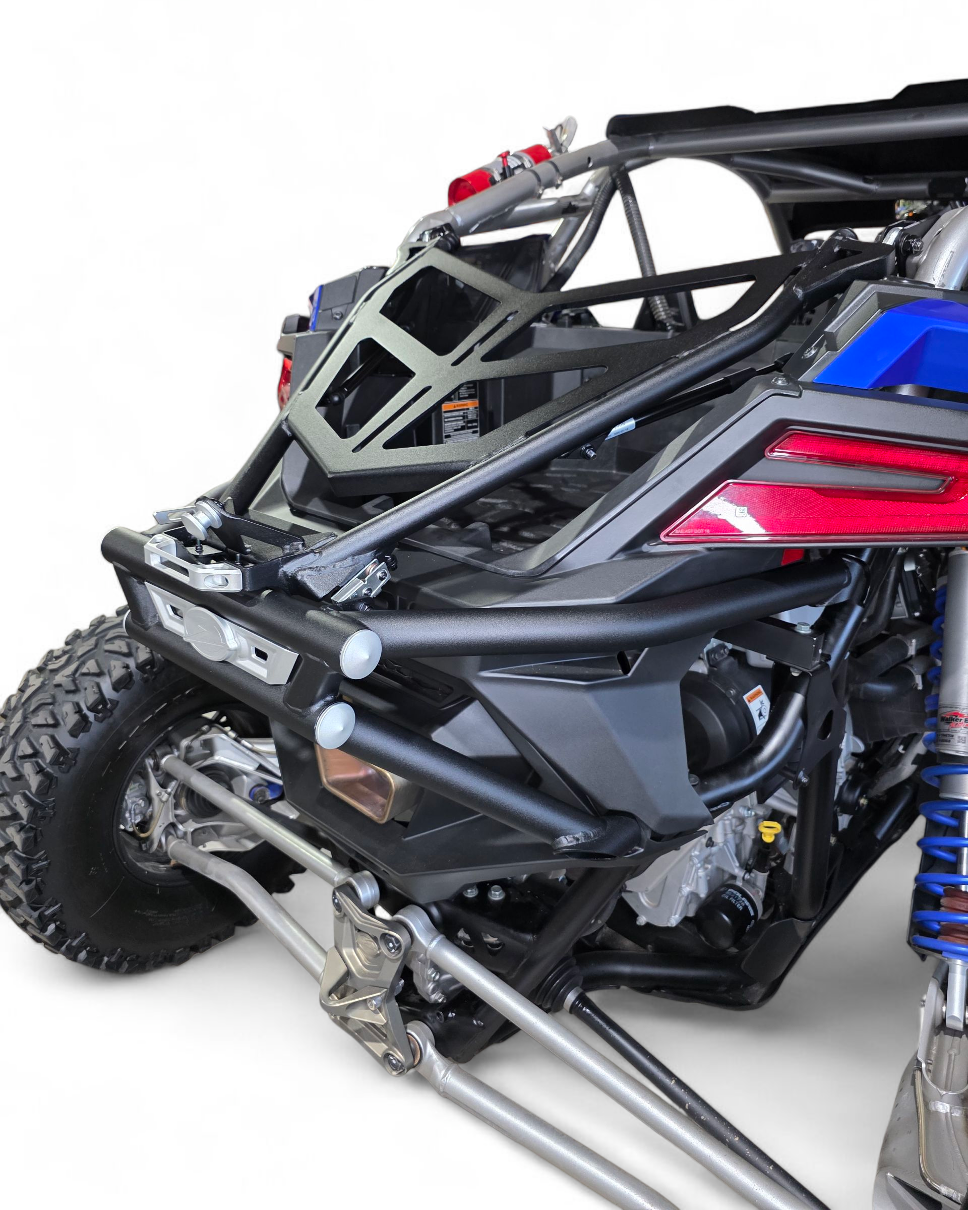 Rear three-quarter view of Polaris RZR Pro R bumper and tire rack combo with spare