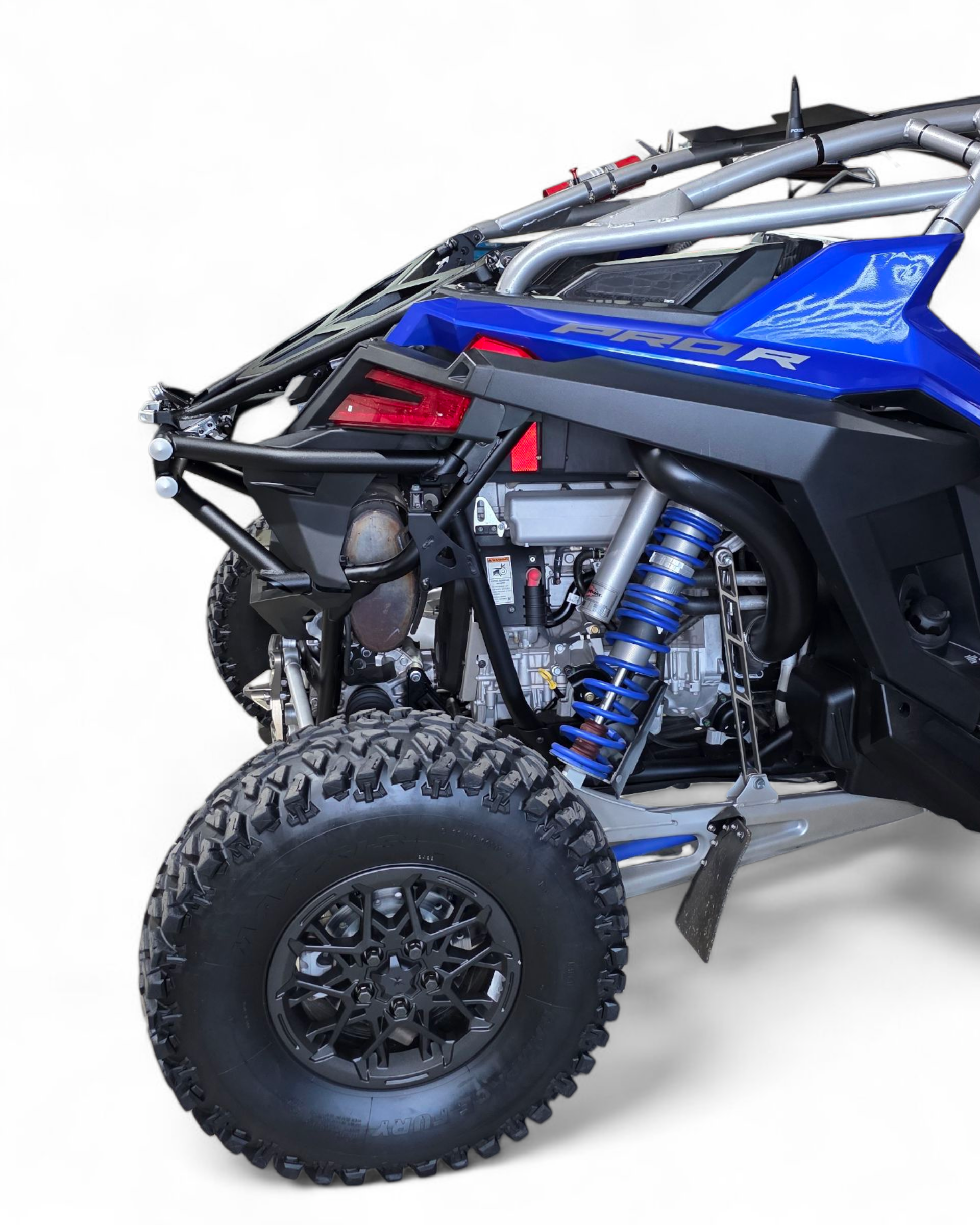 Driver side view of Amp rear bumper tire rack combo on Polaris RZR Pro R
