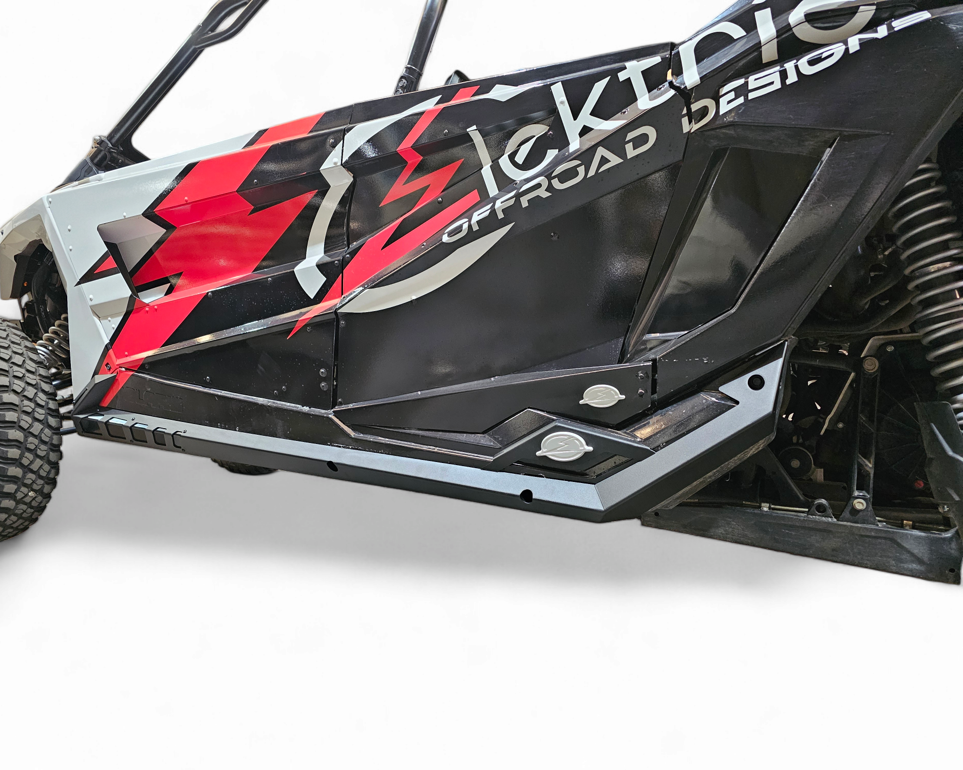 Billet aluminum badge detail on Polaris RZR Volt Series rock sliders