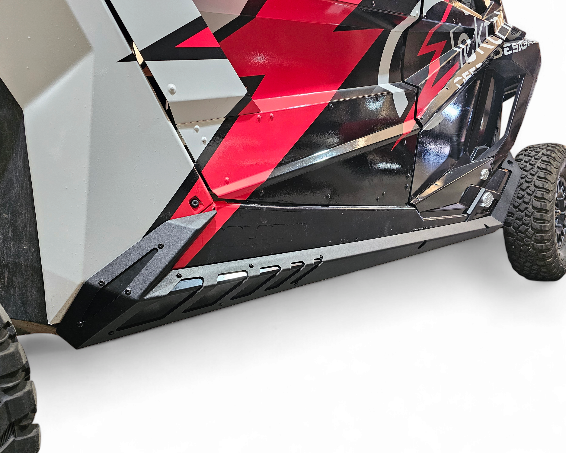 Volt Series Rock Sliders installed on 4-seat Polaris RZR Pro R showing steel construction and hammer black finish