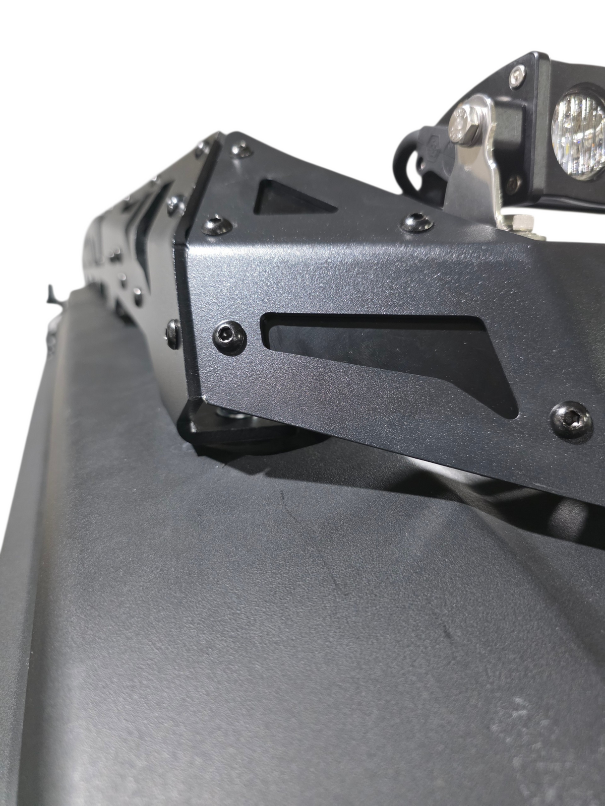 Close-up of the roof rack front corner on a black Xpedition roof