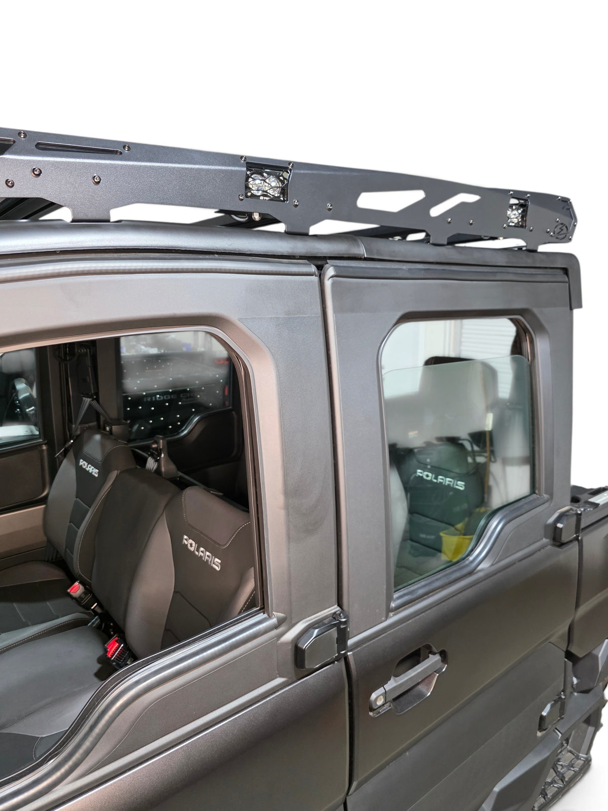EOD roof rack mounted on a 4-seat Xpedition, seen from the rear door side with seats visible