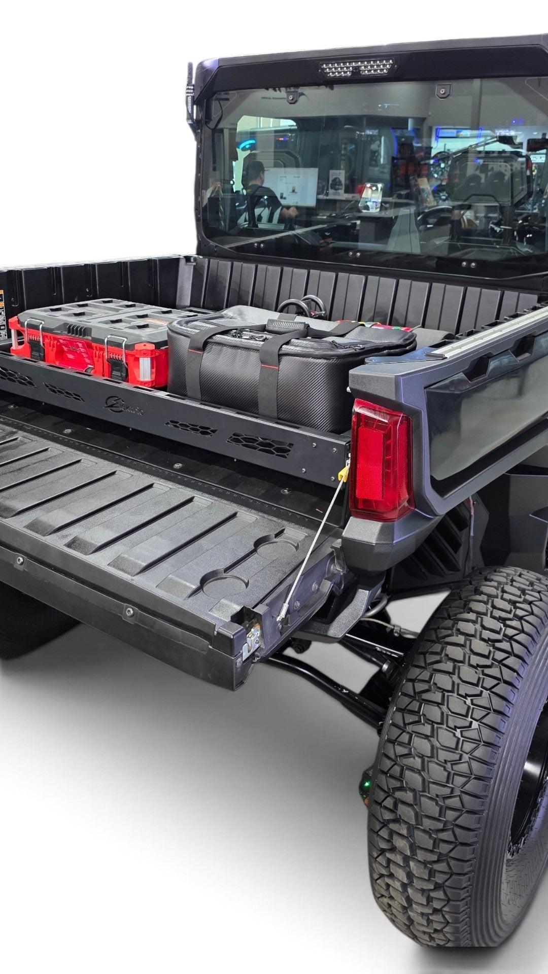 HDX Sliding Bed Drawer loaded with tools and job site gear
